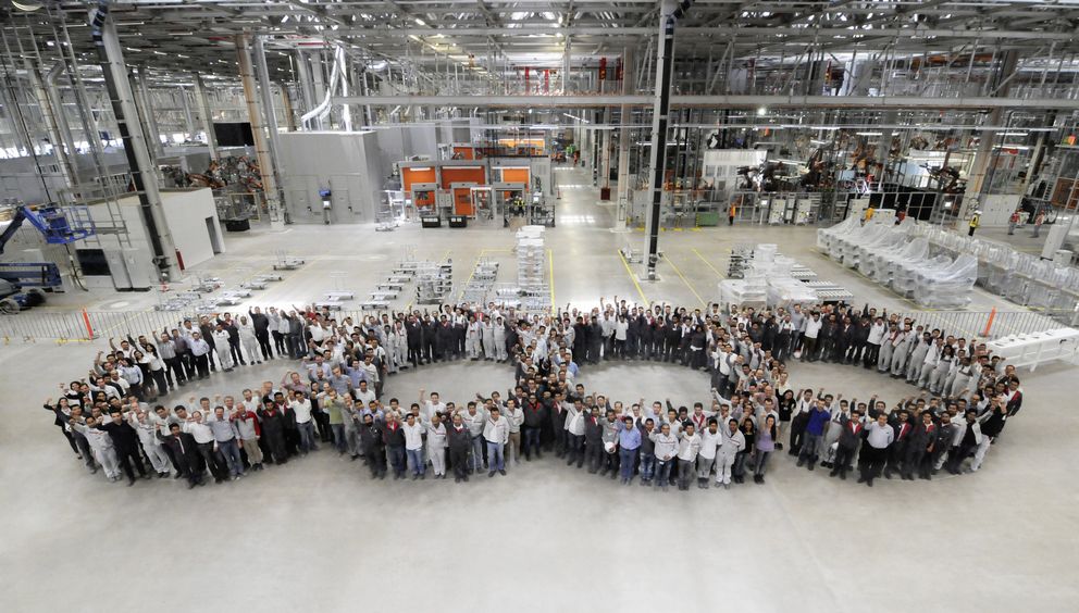 Workers on the occasion of the internal inauguration of the body shop.